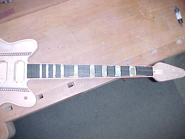 Fretboard attached before binding